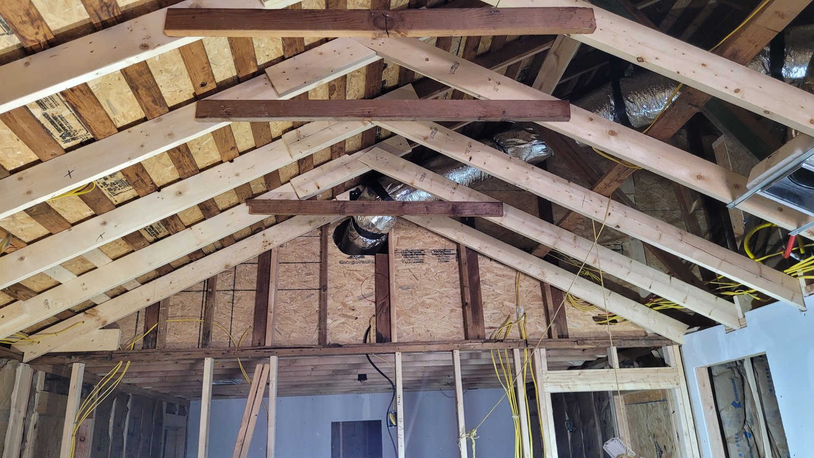 Commercial drywall installation in progress inside office building