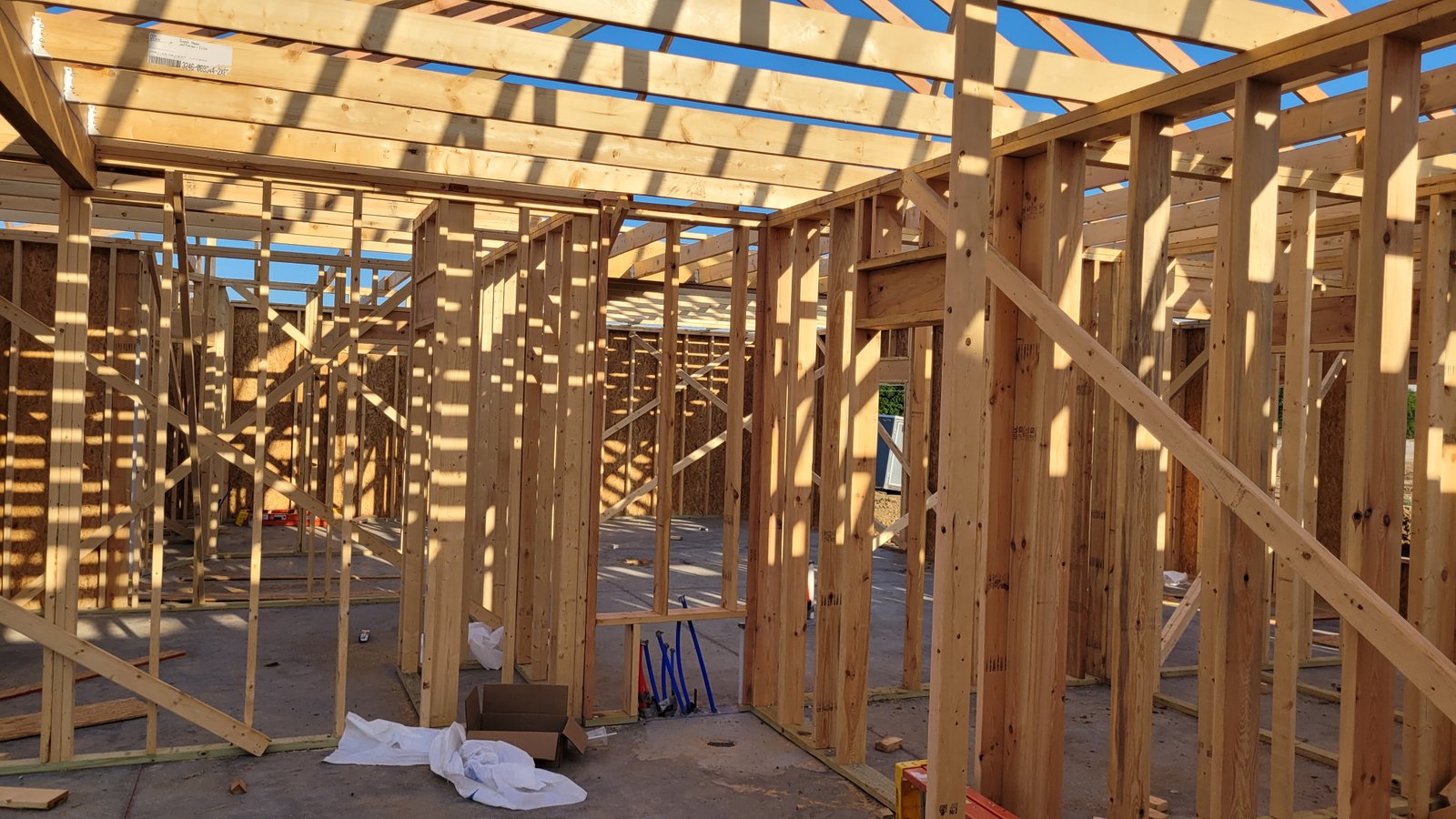 Interior wall framing with wood studs for new construction